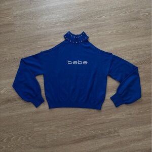 bebe blue rhinestone shoulder cut-out sweater